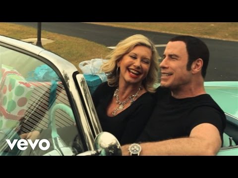 John Travolta and Olivia Newton-John Make New Creepy Christmas Song with Video
